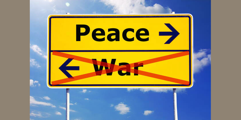peace and war peace and war concept with yellow road sign PUBLICATIONxINxGERxSUIxAUTxONLY Copyright: xgunnar3000x 489768